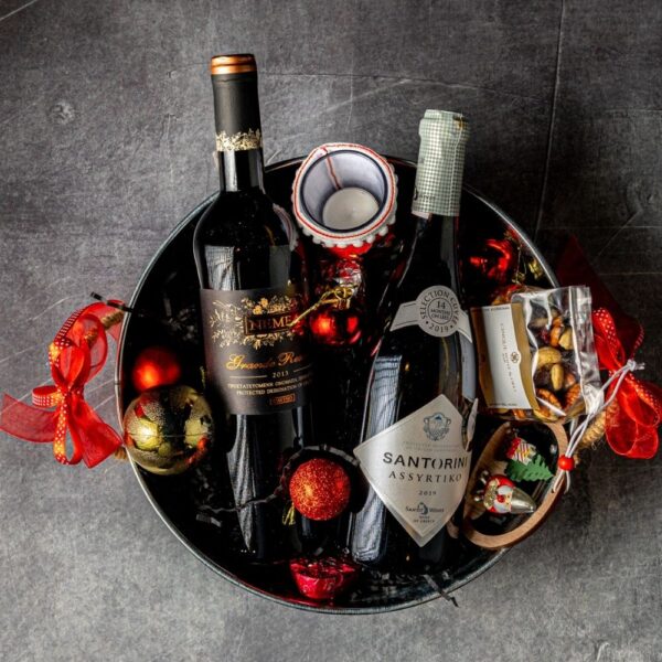 Metal bowl with a wine & delicacies