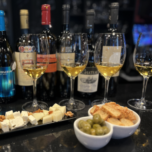 Photo showcasing the Cinque Wine & Deli Emblematic Greek Wine Tasting Experience available at Cinque Wine Bar Monastiraki Athens